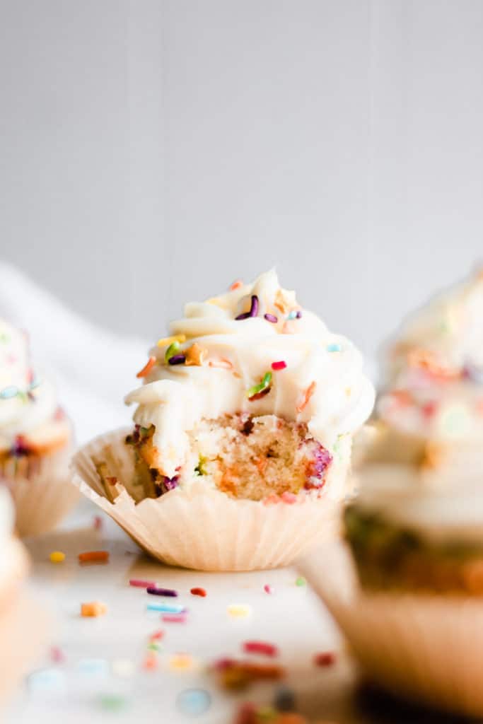 Funfetti cupcake with bite out of it
