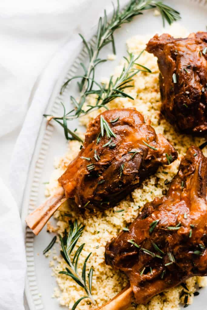 Close-up of lamb shanks and couscous