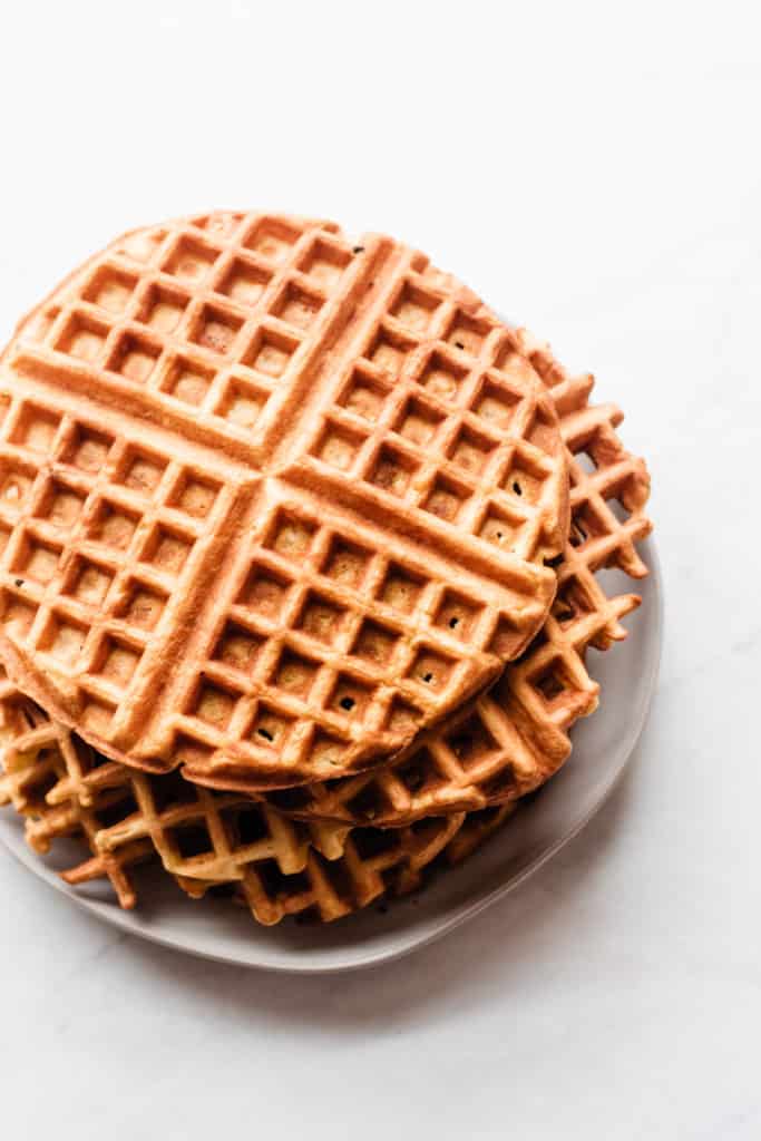 Waffles stacked on a plate