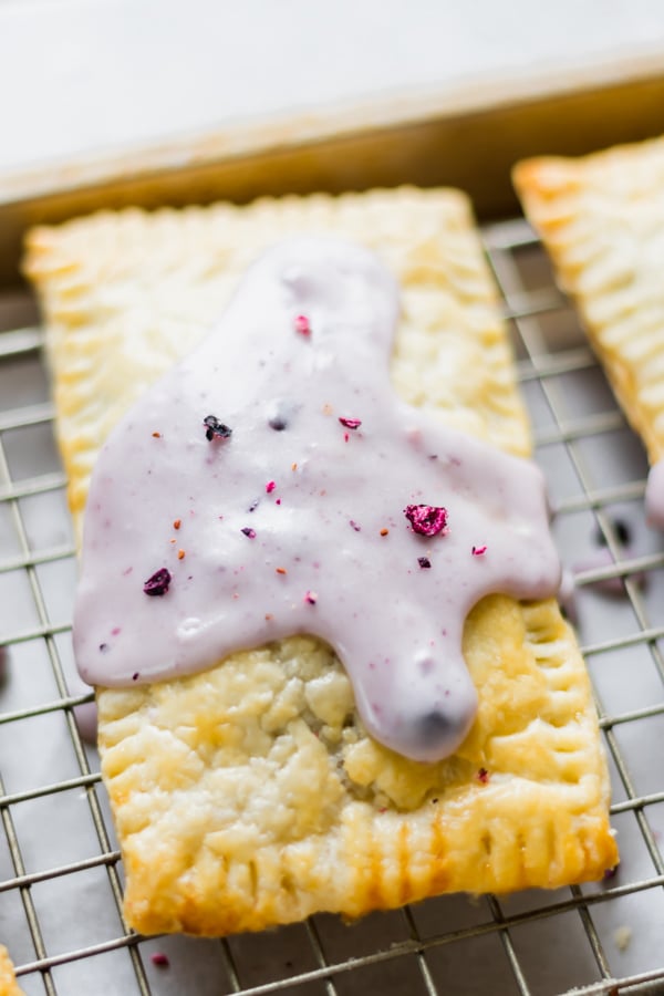 Blueberry poptart on a cooling rack.