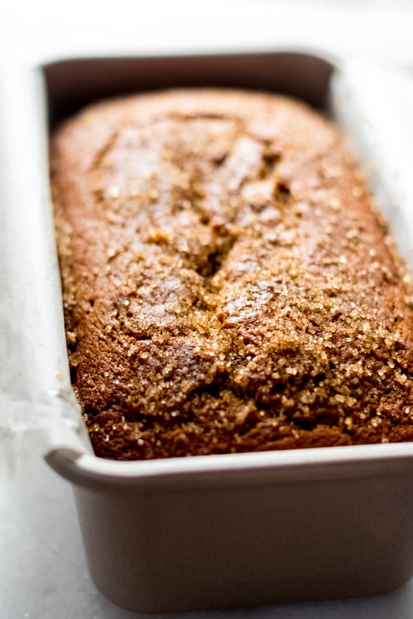 A close-up of the baked plain pumpkin bread in a loaf pan.