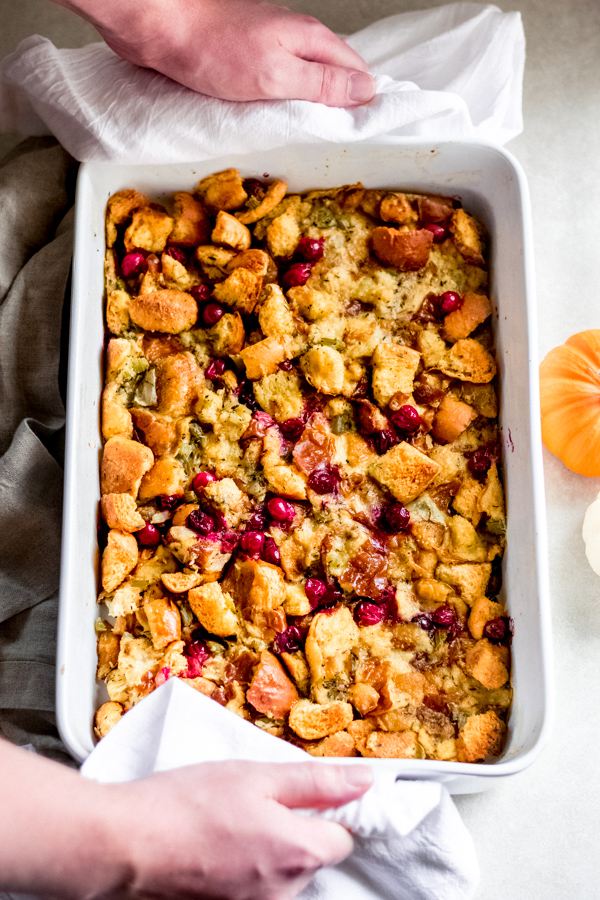 Brioche stuffing with cranberries in a pan.
