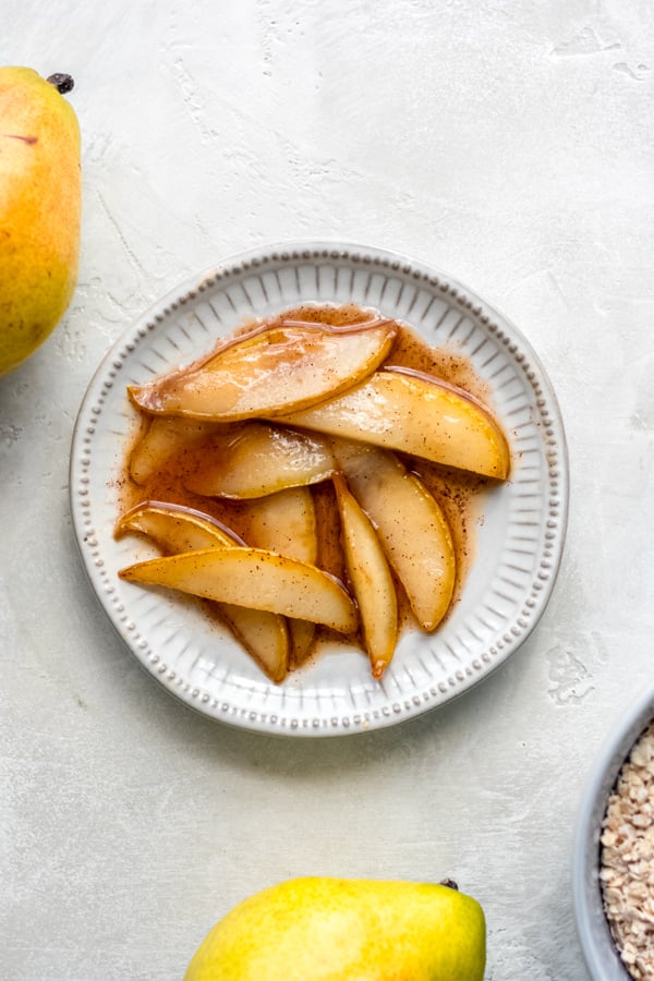 Caramelized pears on a plate.