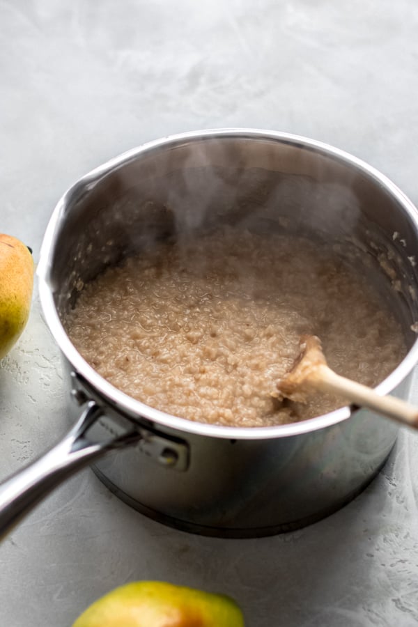 Oatmeal cooking in a pot.