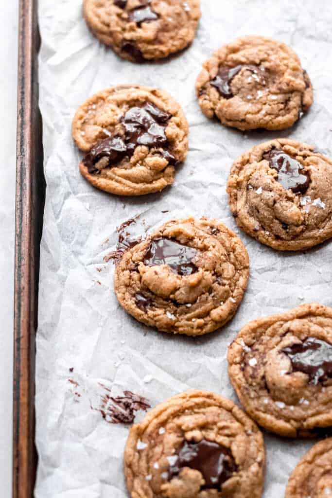 Chocolate chunk cookies on a baking tray.