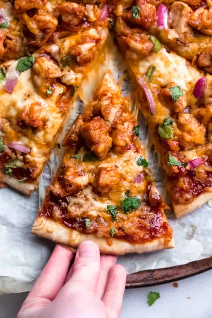 Slices of barbecue chicken pizza.