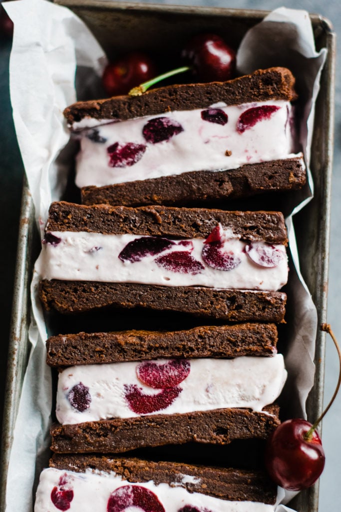 A close-up on a stack of black forest ice cream sandwiches.