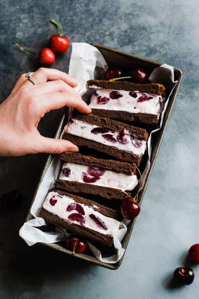 Black Forest ice cream sandwiches in a tin.