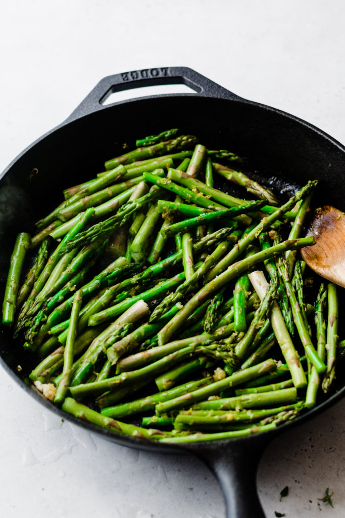 Asparagus in a cast iron skillet.