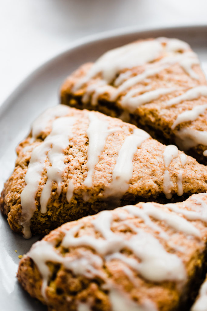 Close-up of pumpkin scones on a plate.