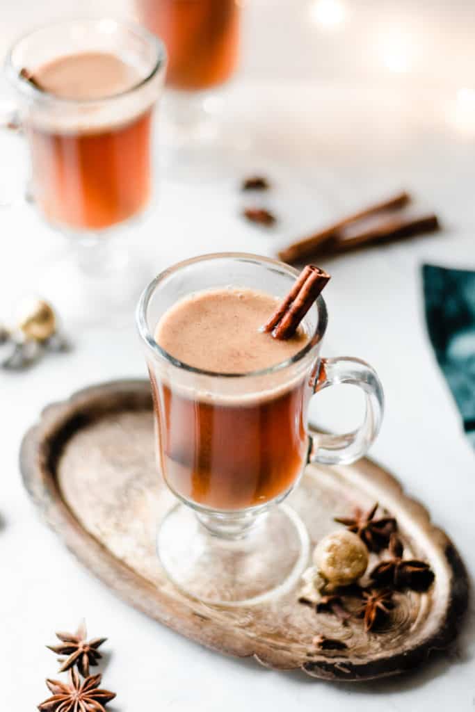Homemade Hot Buttered Rum - Hot Buttered Rum is incredibly easy to whip up, and it's warm, comforting, and cozy! Made with rum, hot water, butter, brown sugar, maple syrup, cinnamon, and nutmeg. Perfect for festive holidays and cold winter nights. #hotbutteredrum #newyearsrecipes #newyearseve #drinkrecipes #christmasrecipes #christmasdrinks #easyrecipes #glutenfreerecipes #bluebowlrecipes | bluebowlrecipes.com
