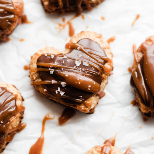 Nutella Pop Tarts in the shape of hearts, topped with nutella glaze and salted caramel.