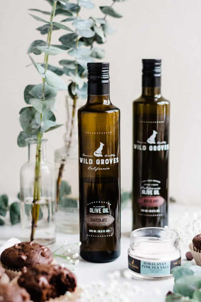 Bottles of Wild Groves Chocolate + Ascolano Olive Oil.