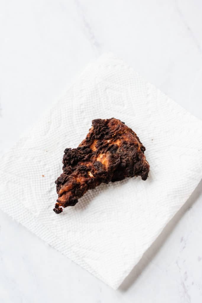 An example of what a burnt piece of fried chicken looks like. 