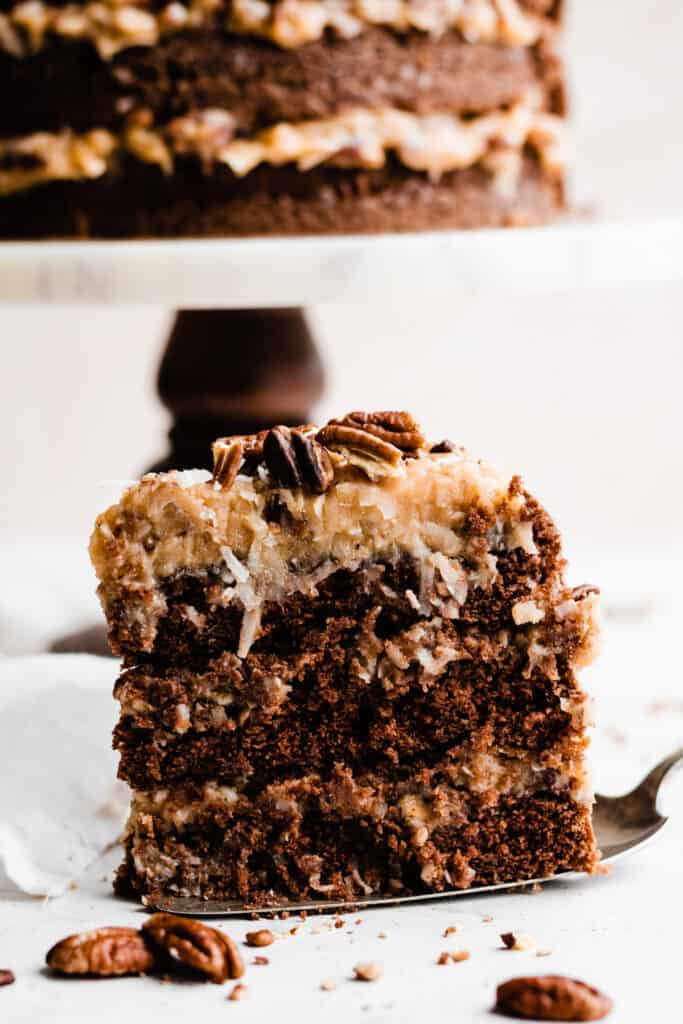 Close-up of a slice of german chocolate cake sitting on a cake server