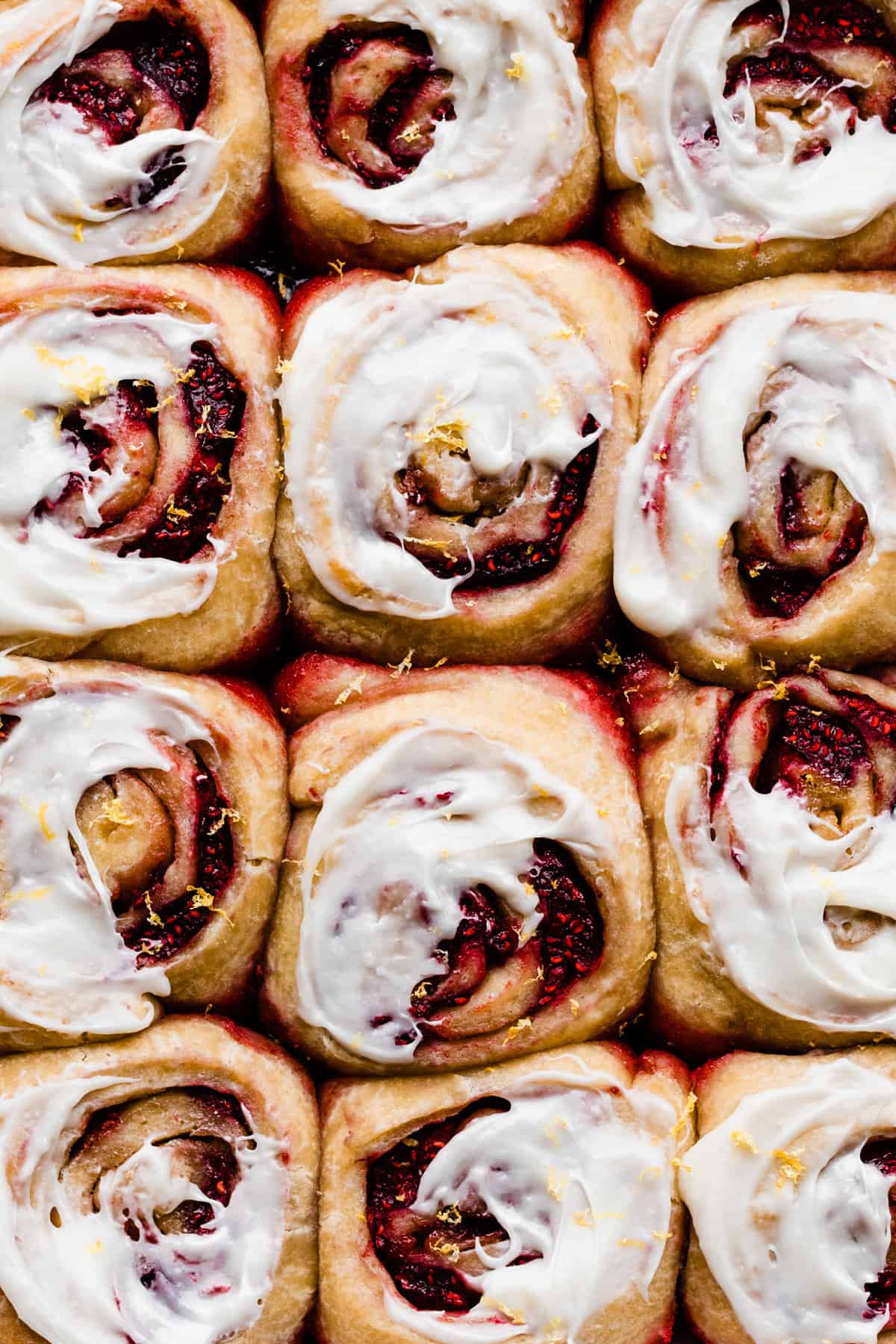 The baked, iced sweet rolls with jammy raspberry filling.