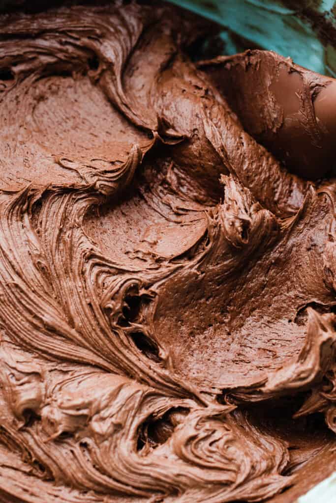 A bowl of the creamy chocolate frosting.
