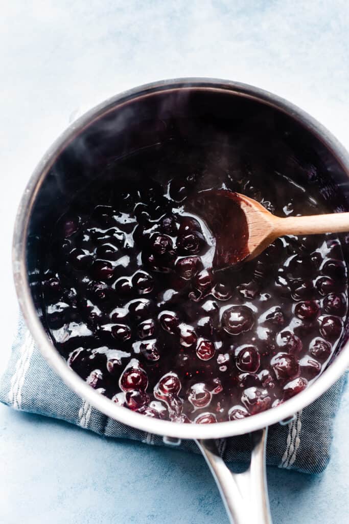 A pot of the blueberry sauce.