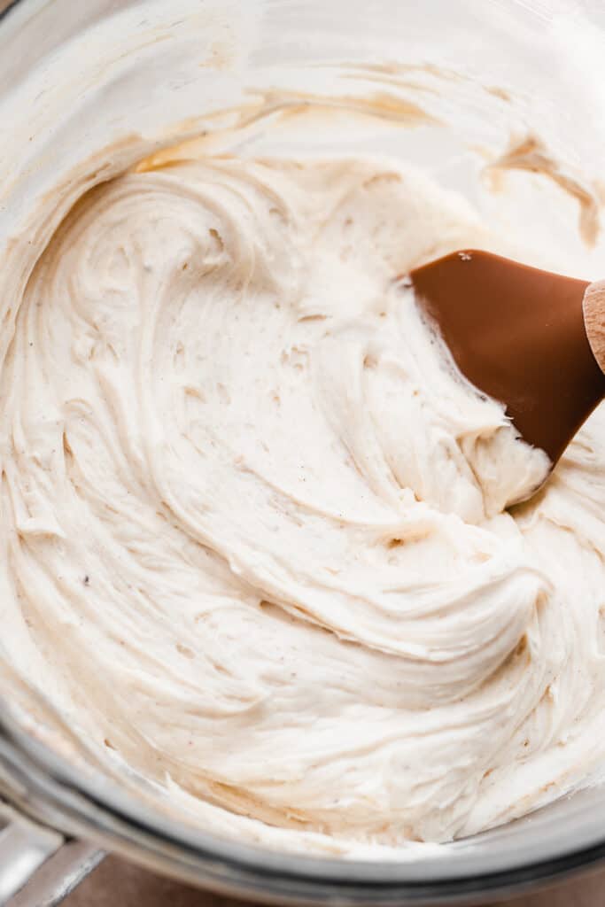 A close-up of the bowl of silky cinnamon cream cheese frosting. 