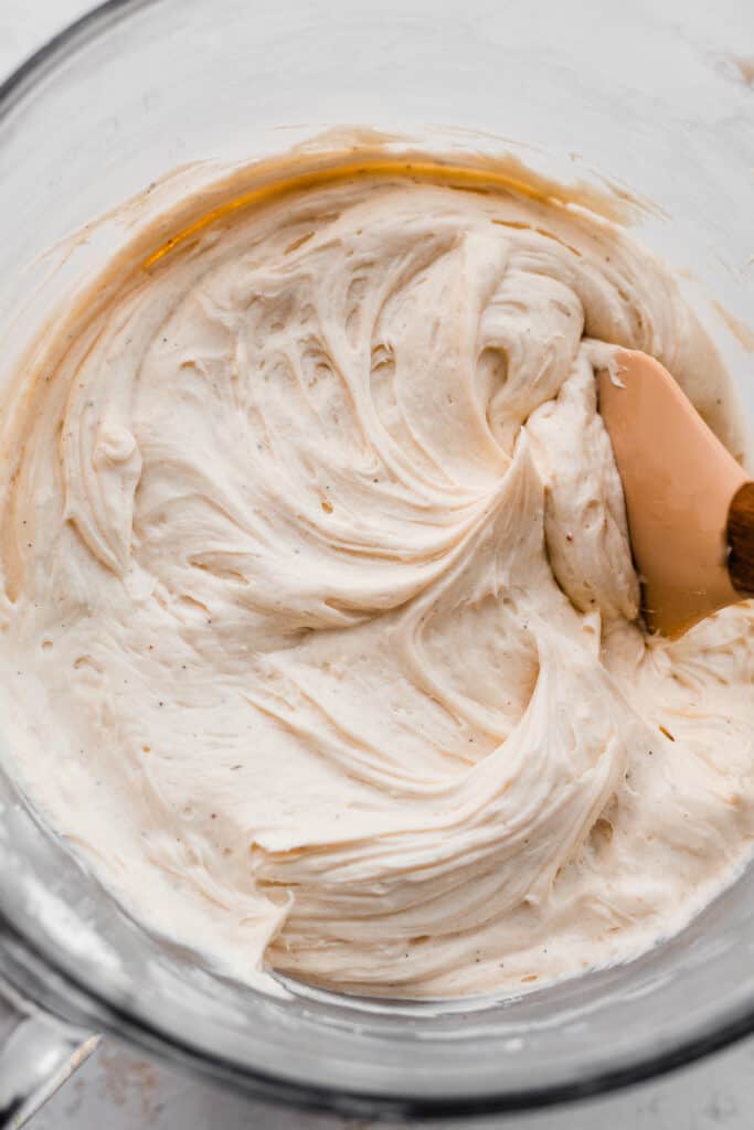 A bowl of creamy brown butter frosting.