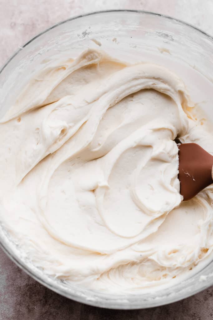 A bowl of cream cheese mascarpone frosting.