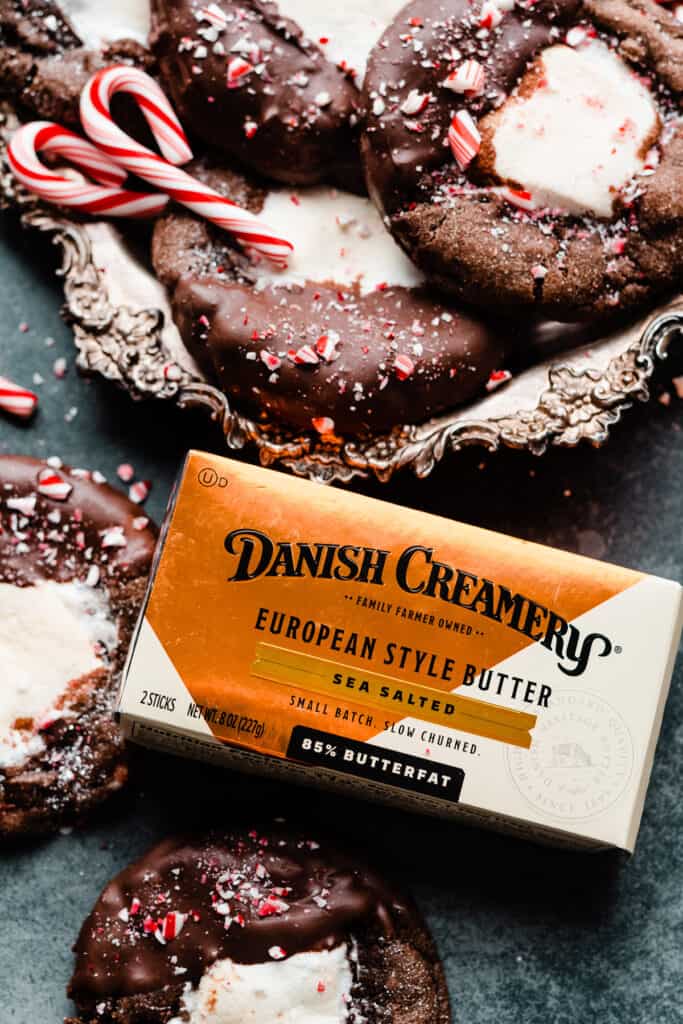 A close up of the Danish Creamery butter package near the tray of cookies.