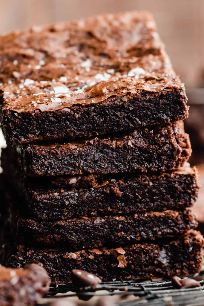 A stack of fudgy gluten free brownies.