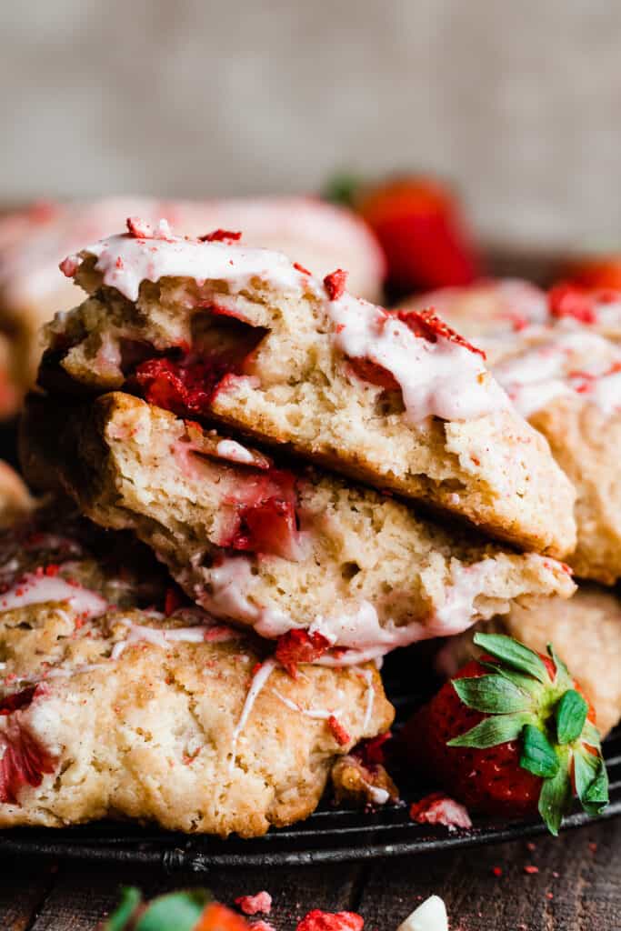 A close-up on two halves of the scones, showing the fluffy insides and strawberries. 