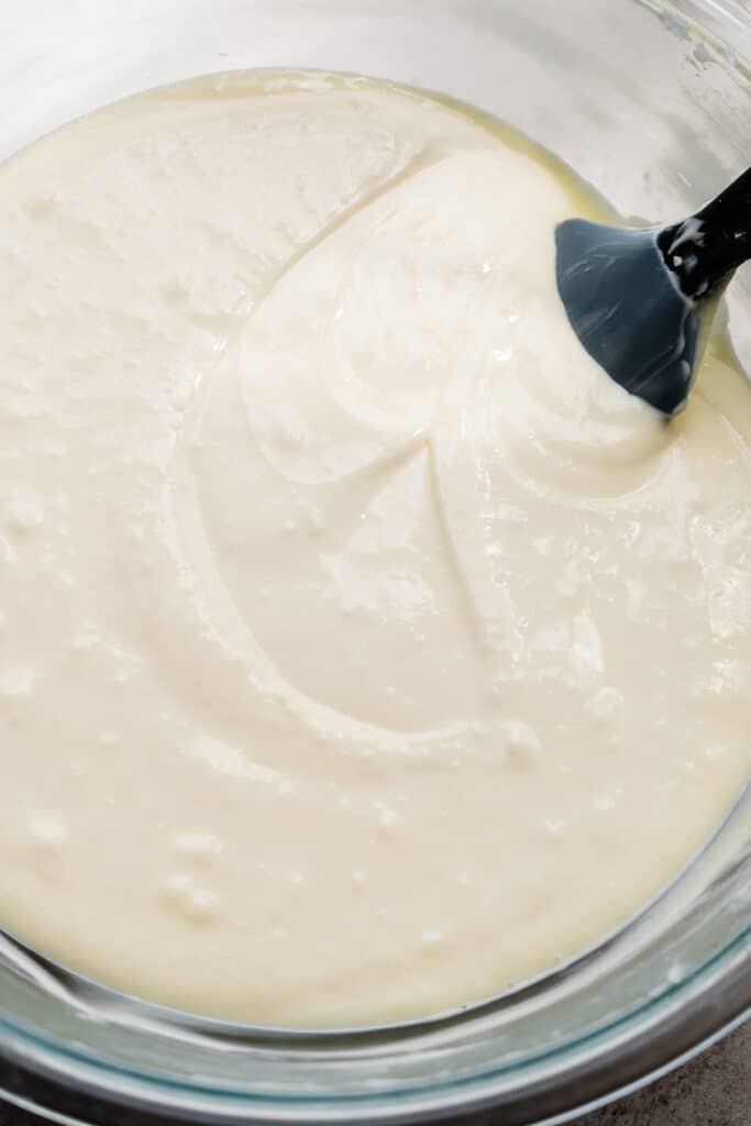 A bowl of the plain cheesecake batter.