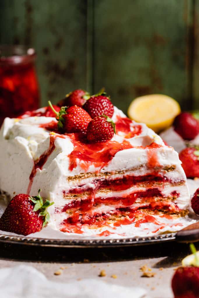 The sliced icebox cake on a platter, revealing the layers inside. 