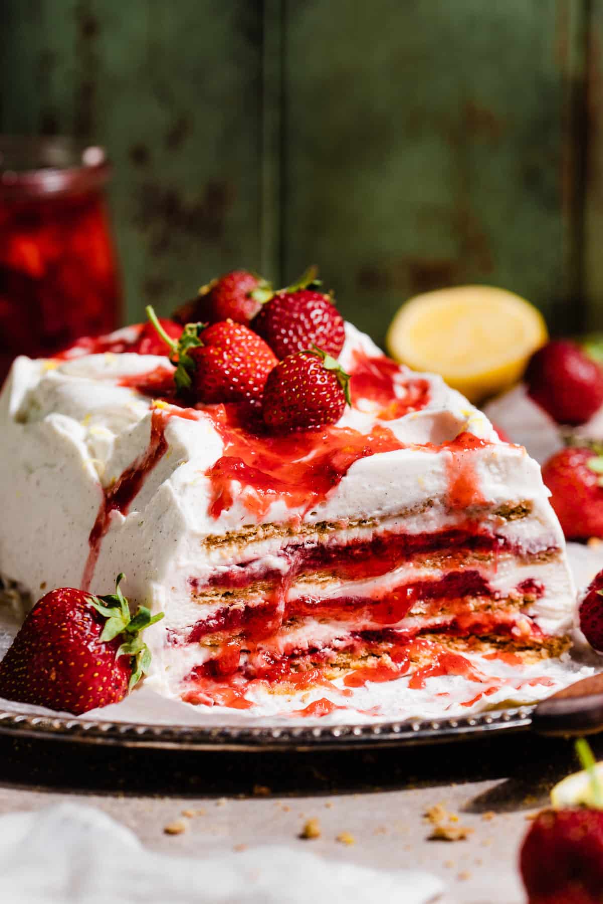 Sliced strawberry icebox cake on a platter.