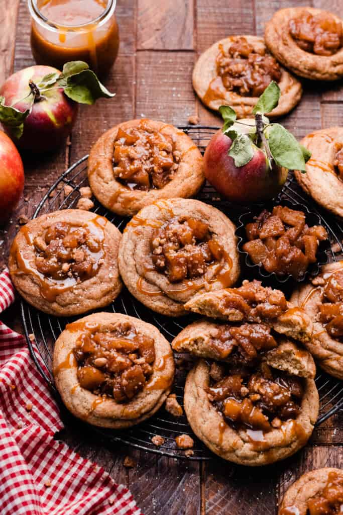 Apple pie cookies on a vintage tray on a wooden surface.
