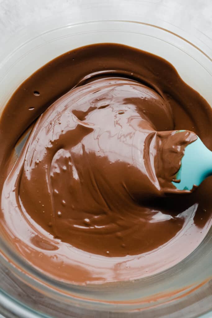 A bowl of melted chocolate.