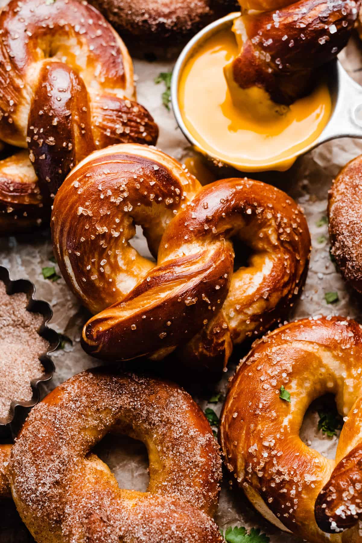 The golden brown, baked pretzels on a vintage wire rack.