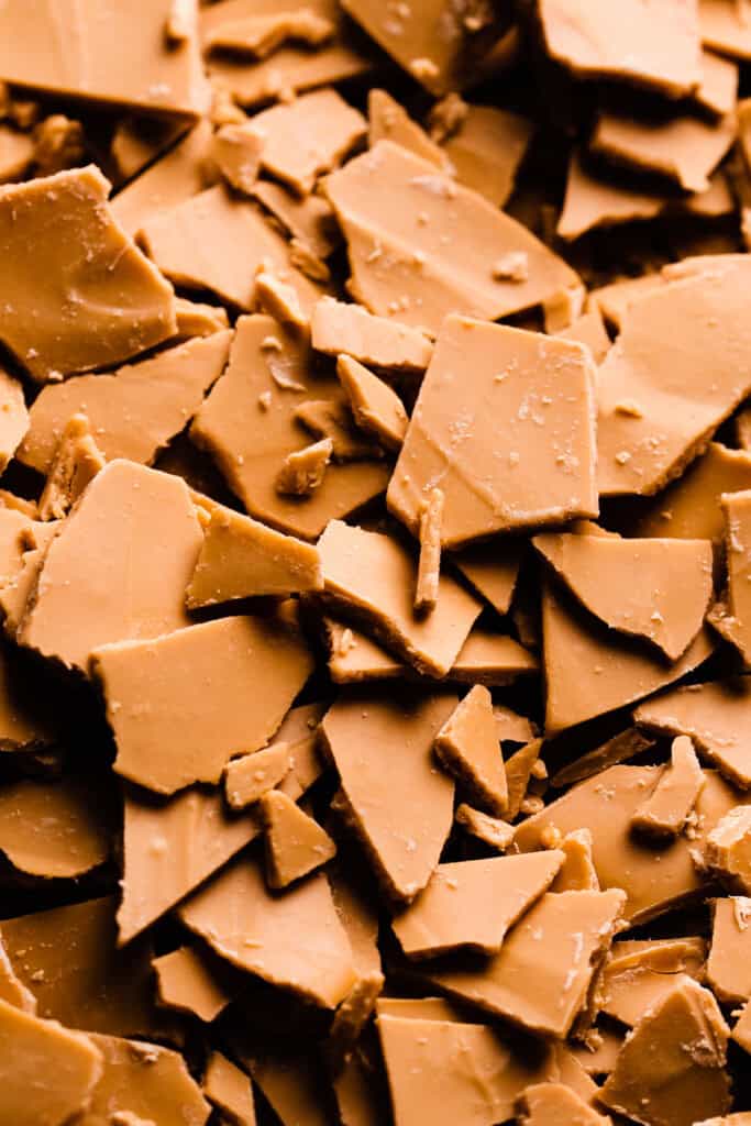 A close-up of chunks of caramelized white chocolate.