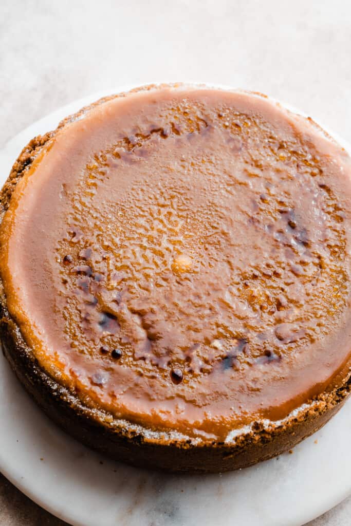 The caramel creme brûlée cheesecake topped with the brûlée topping.